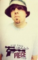 DJ Shadow wearing UNKLE T-shirt